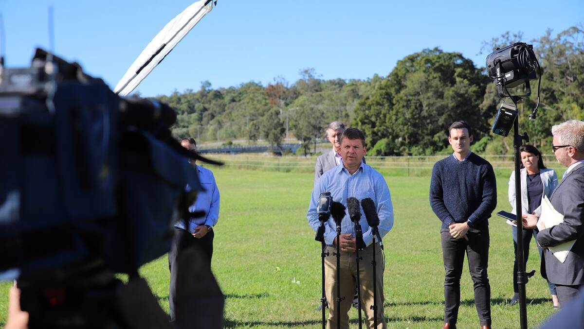 BRIDGE: Jon Krause joined LNP colleagues Tim Mander and Mark Boothman to announce an LNP commitment to strengthen the John Muntf Causeway if elected. Photo: Supplied