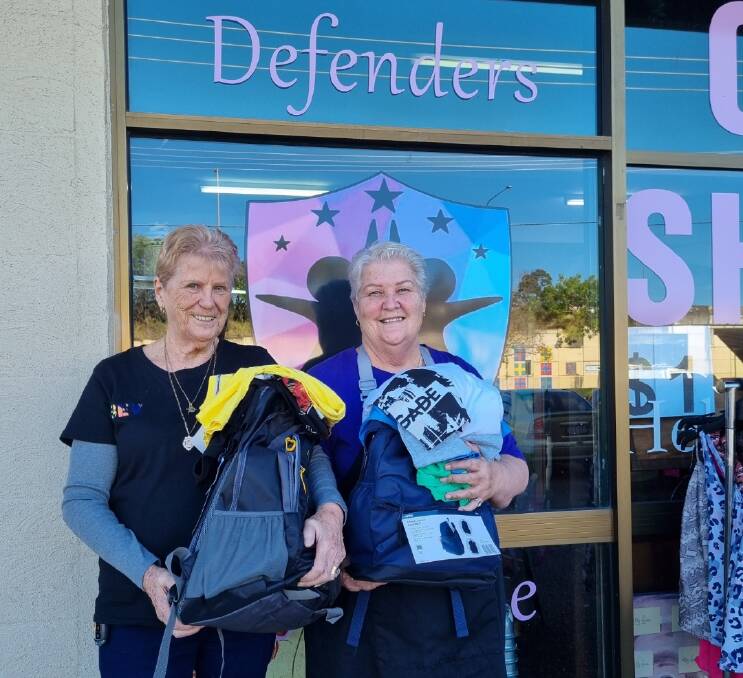 Volunteers Bev Martin and Lyn Davies with Defenders packs for the homeless. Photo suppled.