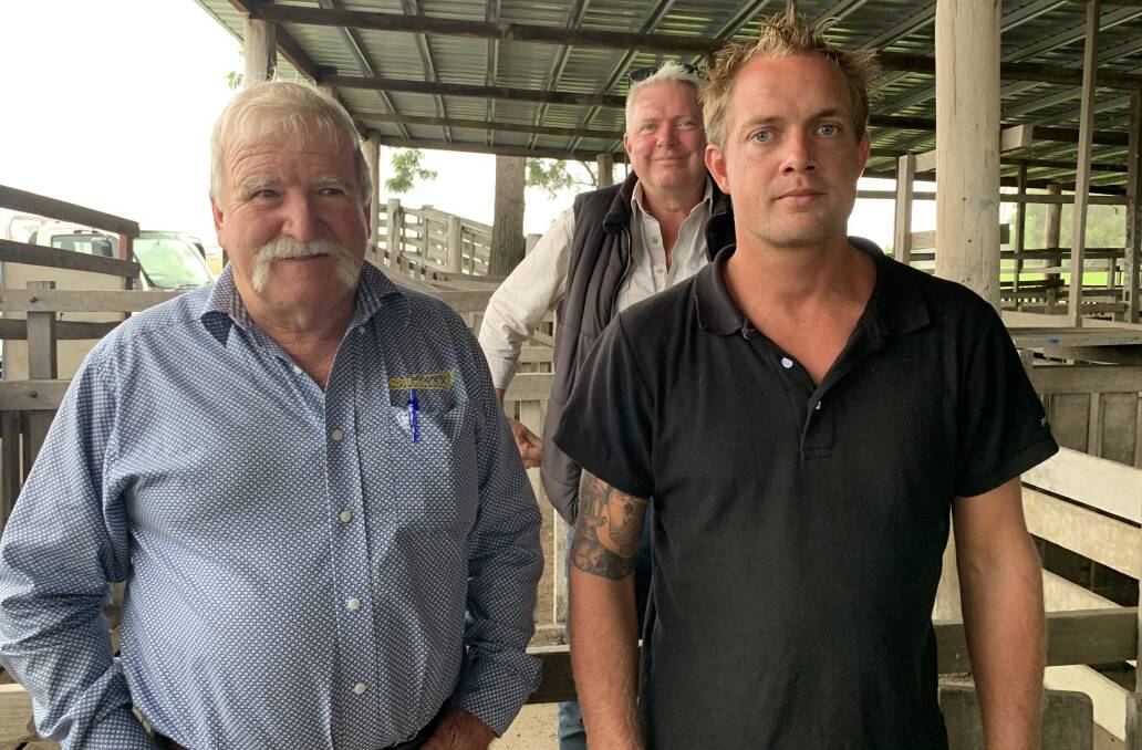HISTORY: Peter Hayes, Tom Sharp and Nathan Clarke at the Helen Street Saleyard today. Photo: Larraine Sathicq