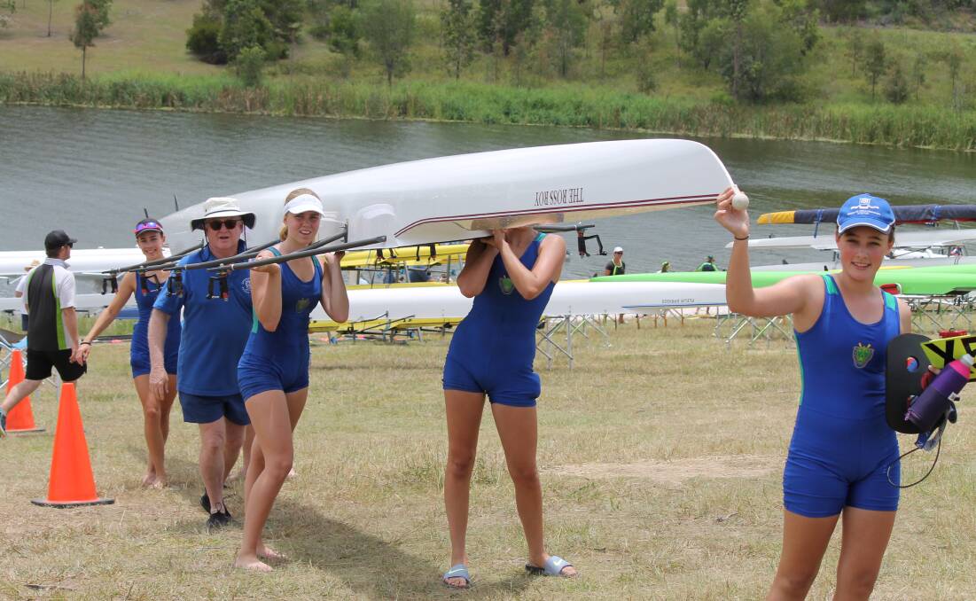 CLOSED: GPS Rowing Club team at a Wyaralong rowing regatta. The area is now closed to recreational users. Photo: Larraine Sathicq