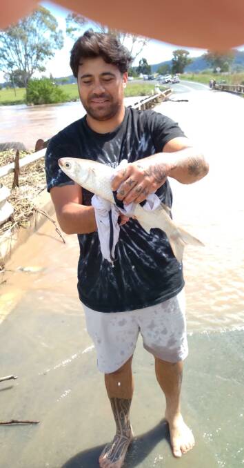 GOOD CATCH: Campbell Horua with his flood catch last week. Photo: Supplied