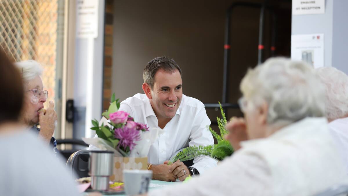 AGED CARE: Labor Member for Rankin and federal Shadow Treasurer Jim Chalmers talks to some elderly people last week. 