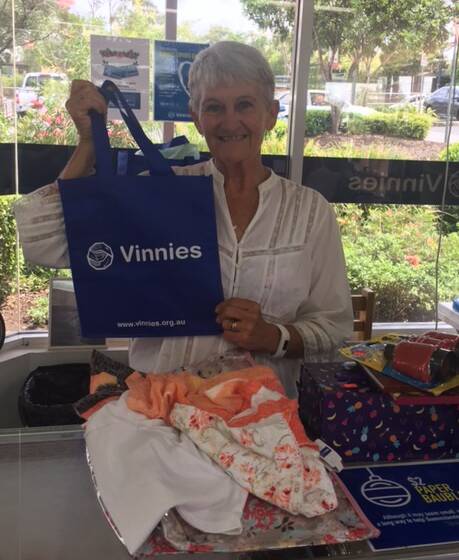 LOCAL VOLUNTEER: Volunteer Reenie Collier, who helps at the Vinnies store at Jimboomba, holds one of the enviro-bags. Photo: Supplied