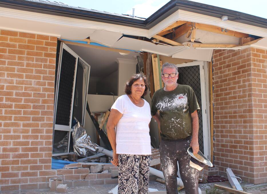 CRASH: Gloria and John Richard Lindgren outside their home where a truck crashed into the wall about 7am on Wednesday. Photo: Cheryl Goodenough
