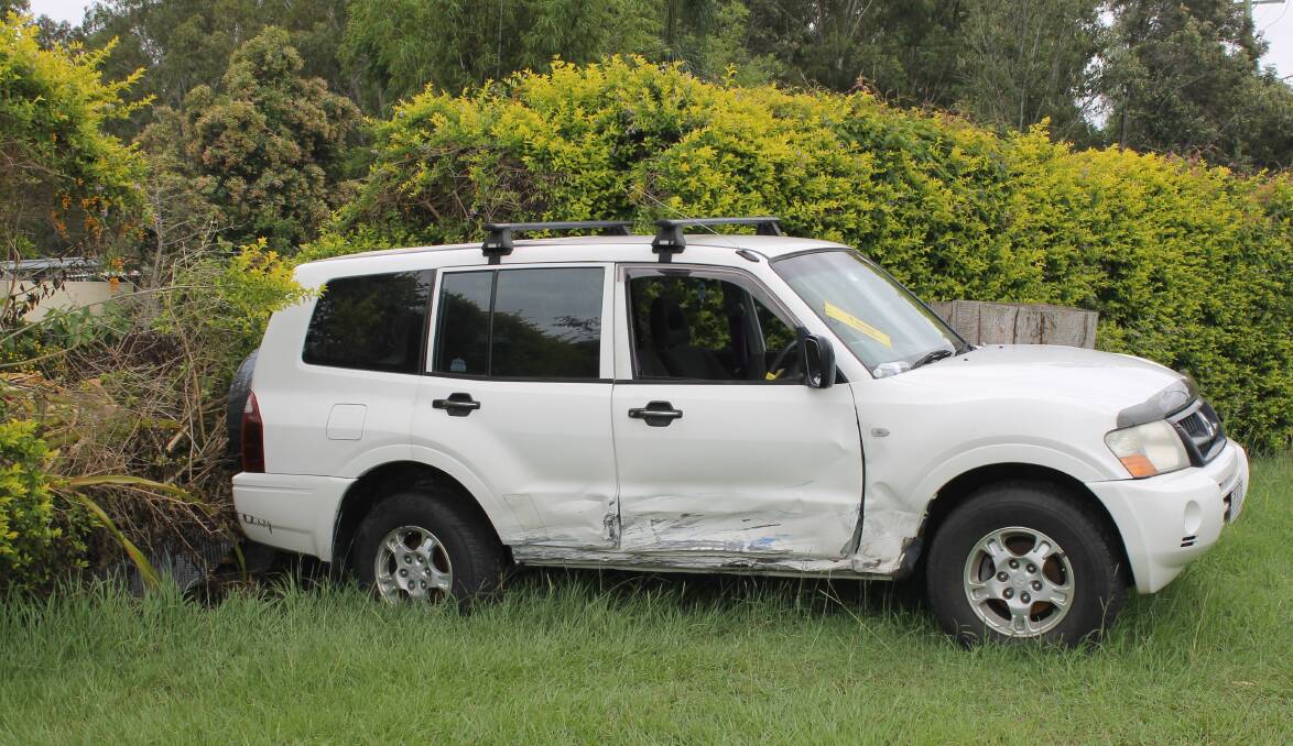 DAMAGED: The damaged car that has been on the roadside since a crash on February 15. Photo: Cheryl Goodenough