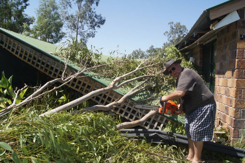 STORM DAMAGE: Jimboomba resident David Bryce in front of his destroyed awning. Photo: Jacob Wilson