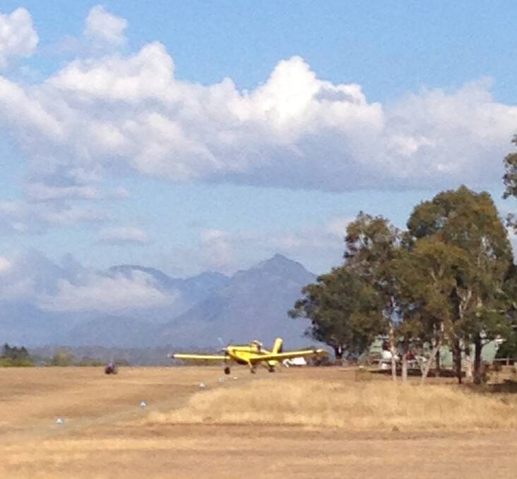 Aerial water bomber on standby at Boonah