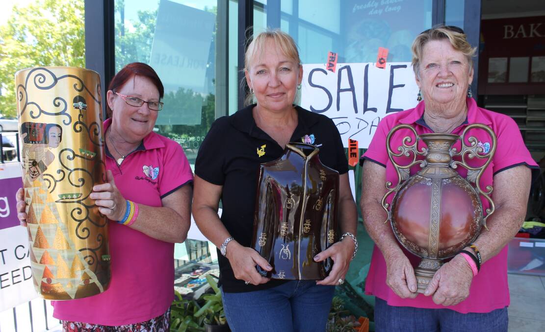 VOLUNTEERS: Gayle Sparkes, Kathy Smith and Wendy Deering from Chicks Conquering Cancer at the Jimboomba pop-up store. Photo: Cheryl Goodenough