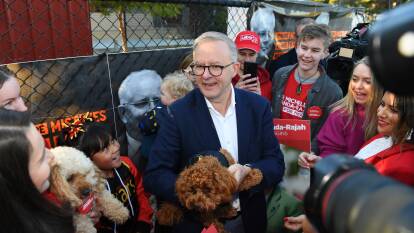 Anthony Albanese talked of "kicking with the wind in the fourth quarter" as he wound up his campaign. Picture: AAP