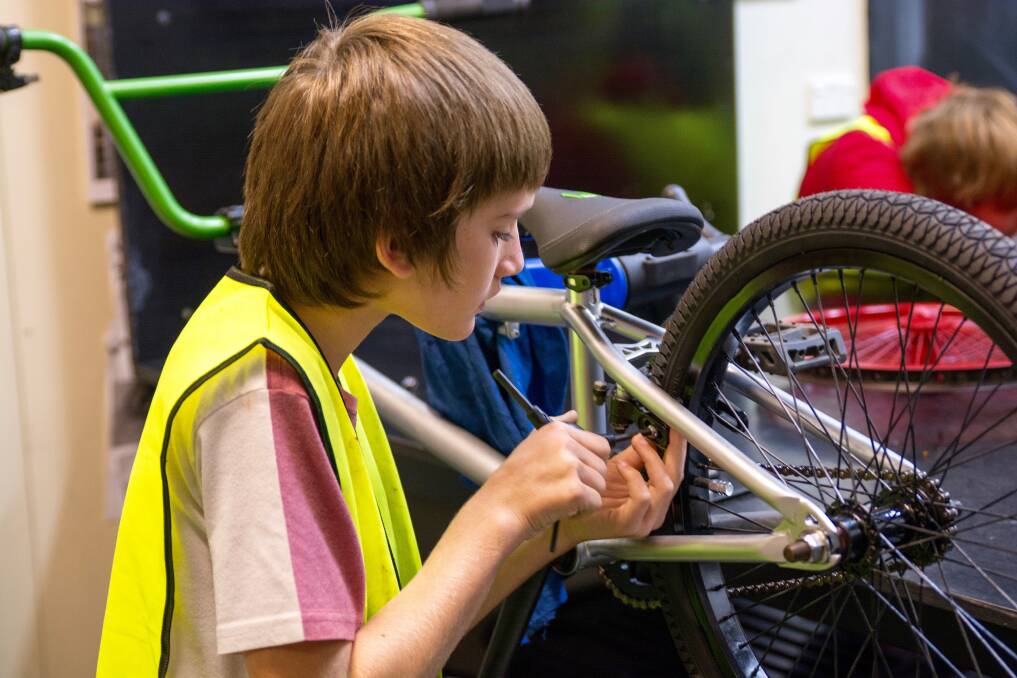 TRACTION is coming to Yarrabilba with their bicycle workshops. Photo: Supplied