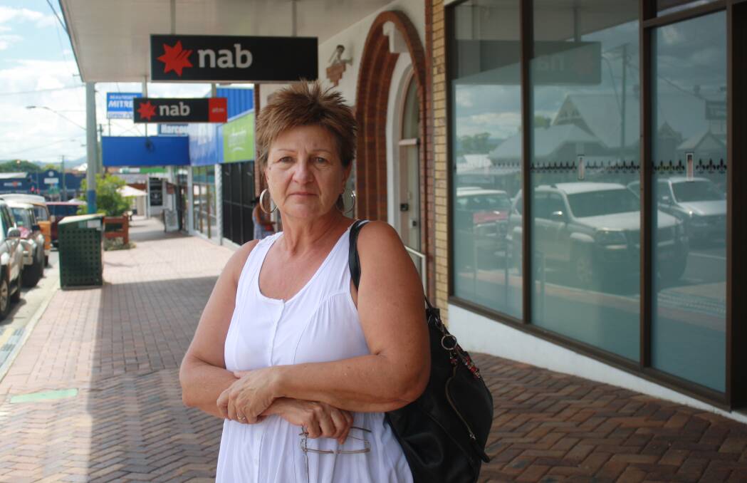 SHOCK: Jimboomba resident Mary Kurinnyi was waiting outside the NAB Beaudesert bank branch until staff members opened the doors after lunch. Photo: Jocelyn Garcia
