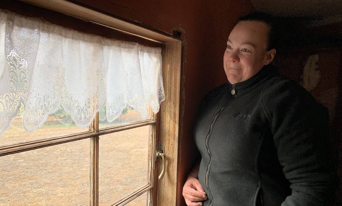 Lizzie McIntosh at the window where she saw a ghost at Cooma Cottage. Picture: Tim the Yowie Man Lizzie McIntosh at the window where she saw a ghost at Cooma Cottage. Picture: Tim the Yowie Man