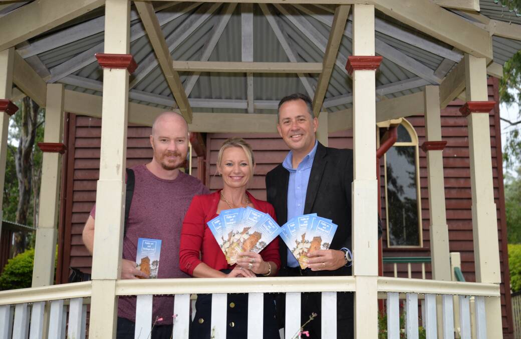 GUIDE: Photographer Marty Pouwelse with Logan City councillors Trevina Schwarz and Steve Swenson at the launch of the second public art and heritage trail.