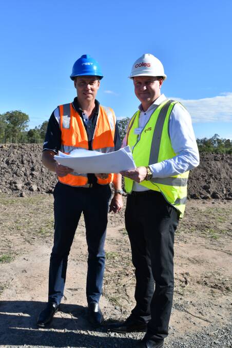 Peet Limited's Flagstone project director Troy Thompson with Coles regional manager Damien Griffiths at the site. Photo: Hannah Baker