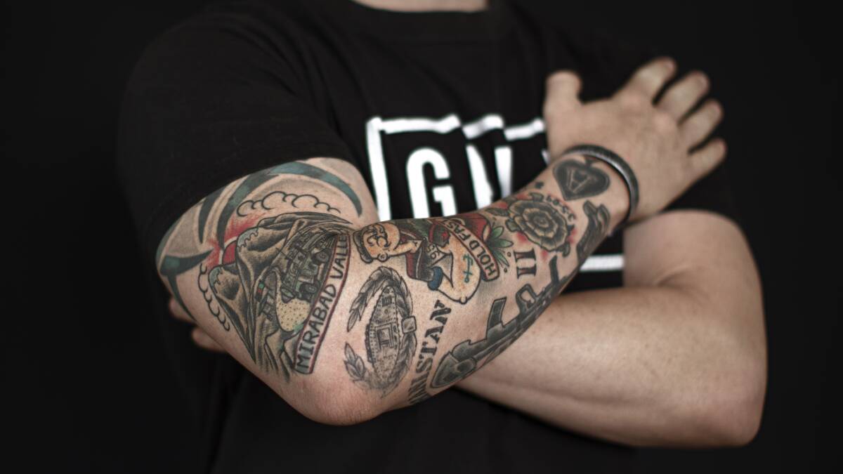 David Nicolson and his tattoos. Picture: Bob McKendry / Australian War Memorial