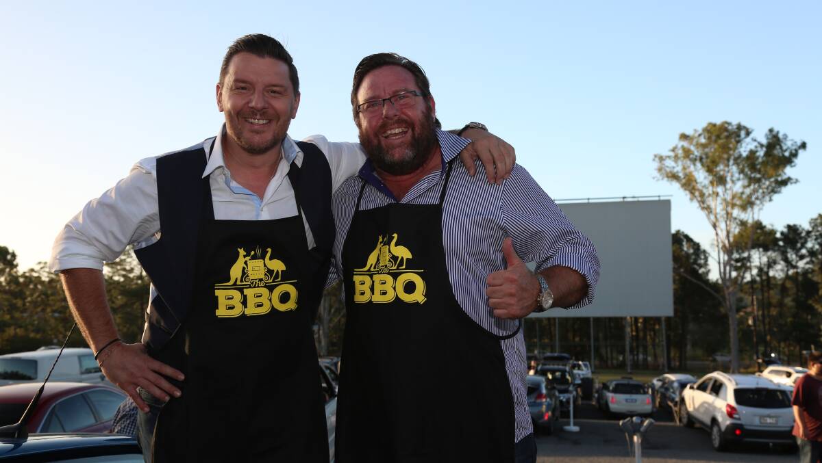BARBECUE: Manu Feildel and Shane Jacobson fire up the barbecue and share their tips at an early screening of The Barbecue at the Yatala Drive In. The film is released on February 22.