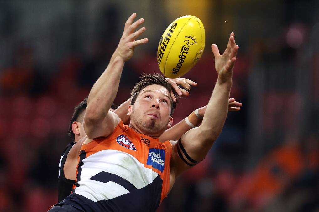Toby Greene of the Giants marks during the match against Richmond Tigers at Giants Stadium on Friday night. Photo: Cameron Spencer/Getty Images