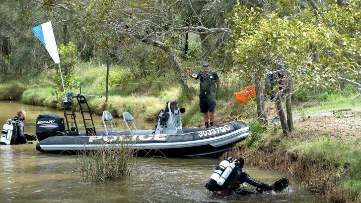 Police and police divers search for clues in the ongoing investigation into Tiahleigh's murder search the river where her body was found. Photo: Bradley Kanaris