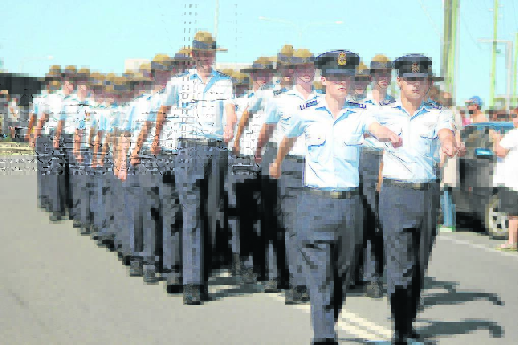 Cadet Under Officer Samuel Foenander and Warrant Under Officer Anthony De Luca lead the Australian Air Force Cadets 214 Park Ridge squadron in this year s Anzac Day march at 
Greenbank.
