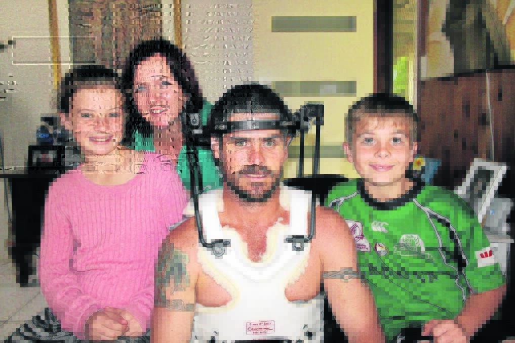 Chris Jones, with wife Sian and children Lucy and Lachy, after his rugby league injury last year.