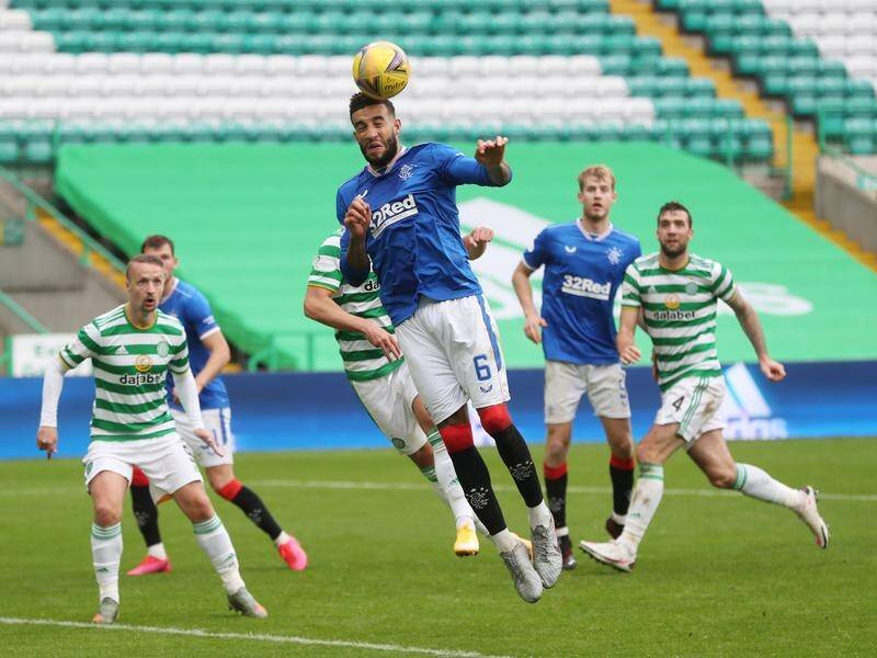 Rangers' Connor Goldson scores his second goal in their 2-0 Old Firm win over Celtic.