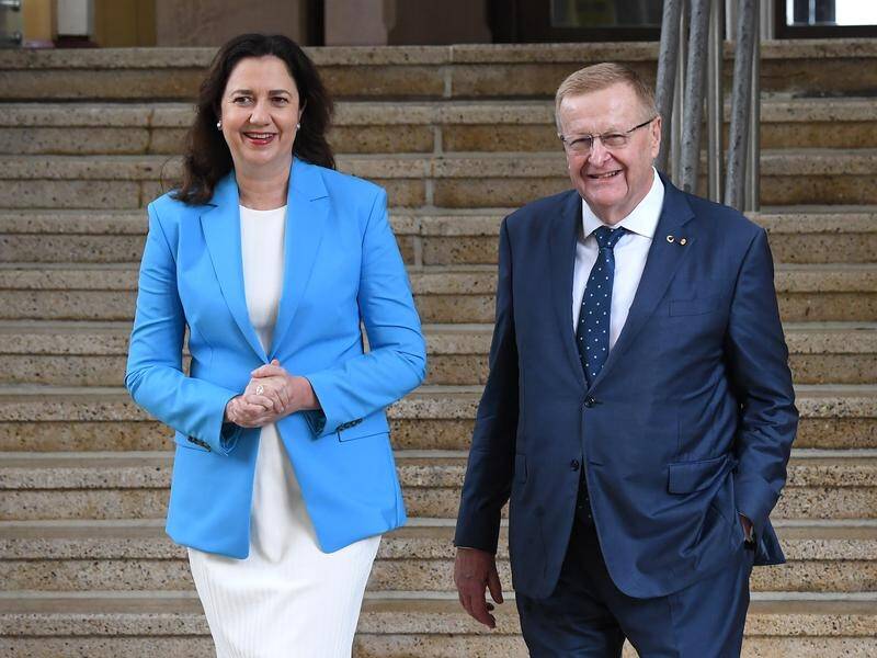 It is a happy day for Queensland Premier Annastacia Palaszczuk and AOC President John Coates.