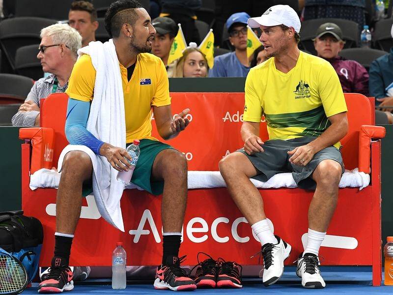Lleyton Hewitt says the door to Australia's Davis Cup team is still open for Nick Kyrgios (L)