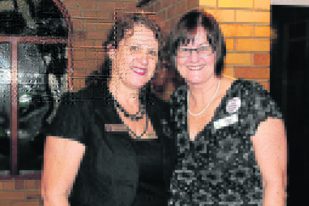 Outgoing Quota president Wendy Fryer is thanked by district governor Sandy Smith.