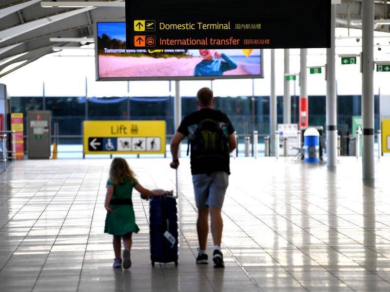 A traveller from PNG who mixed with passengers bound for NZ at Brisbane Airport has tested positive.