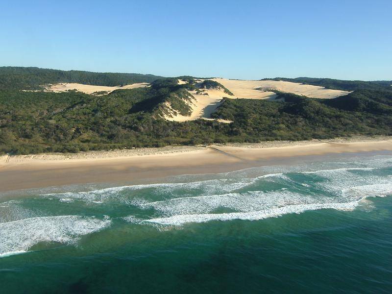 Tourists will be turned away from Fraser Island due to a bushfire which has been burning for weeks.
