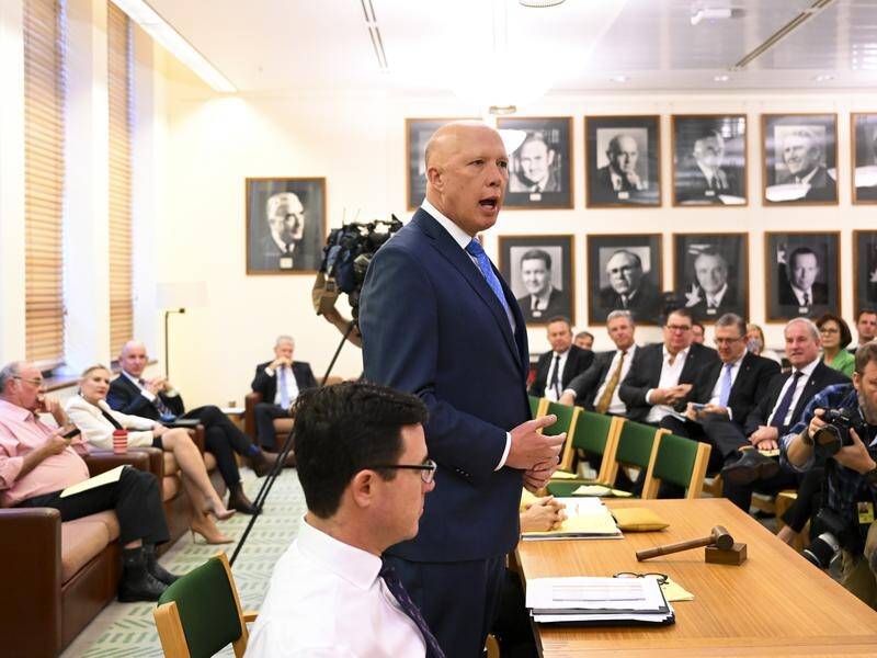 Peter Dutton addresses coalition colleagues who have opted to oppose Labor's climate laws. (Lukas Coch/AAP PHOTOS)
