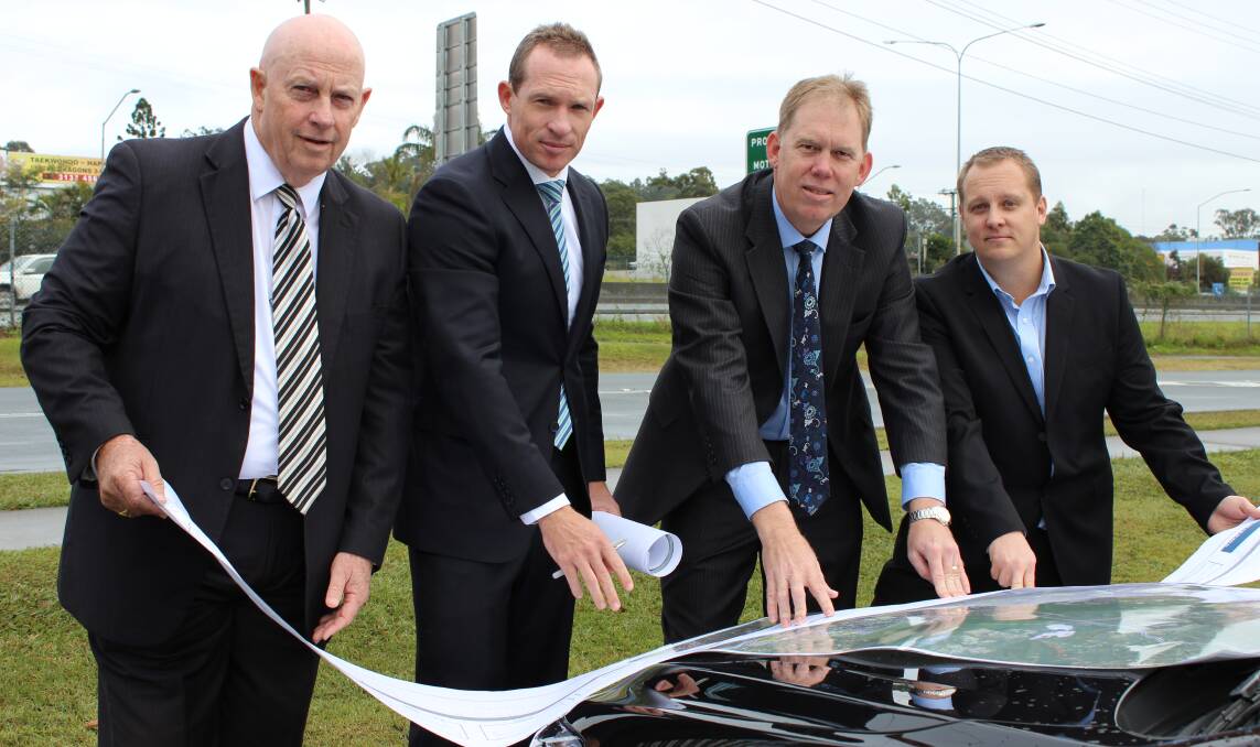 Logan Chamber of Commerce president Bill Richards, state member for Springwood Mick de Brenni, federal member for Forde Bert van Manen and Beenleigh-Yatala Chamber of Commerce executive Michael Rose want to see improvements made to the M1.
