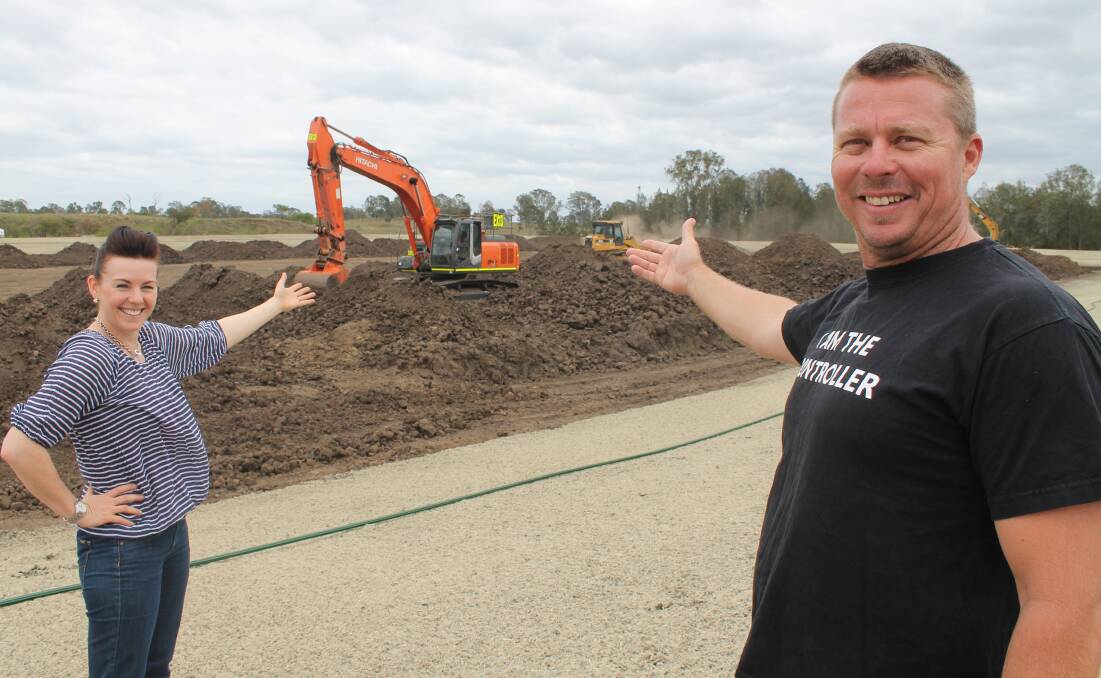 Supercross event organiser Scott Bannan and Hills College P and F president Jennifer Reeves visit the site of Jimboomba's new motocross track as works are completed. The pair is predicting huge crowds at the track when Jimboomba hosts the Queensland Supercross Championships in December.