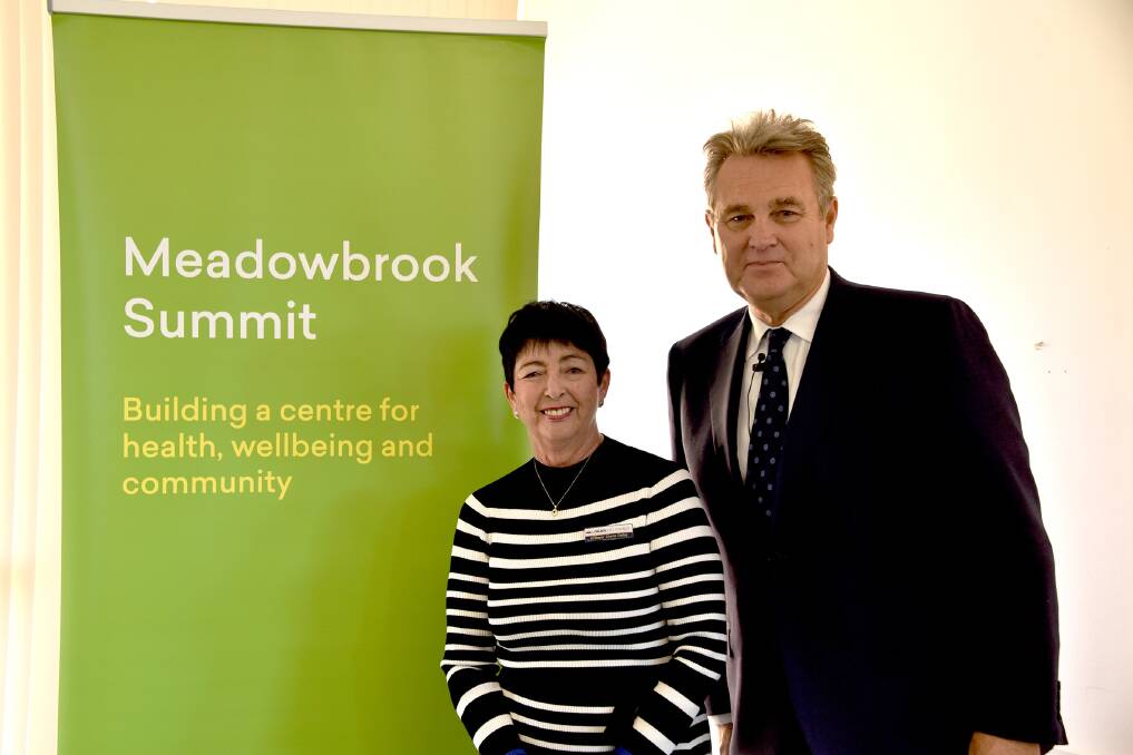 SUMMIT: Logan acting mayor Cherie Dalley with demographer Bernard Salt, keynote speaker at the Meadowbrook Summit.
