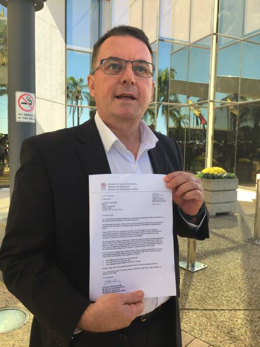 SUSPENDED: Mayor Luke Smith with a print out of the email he received from the Local Government Minister's office. Photo: Lisa Simmons
