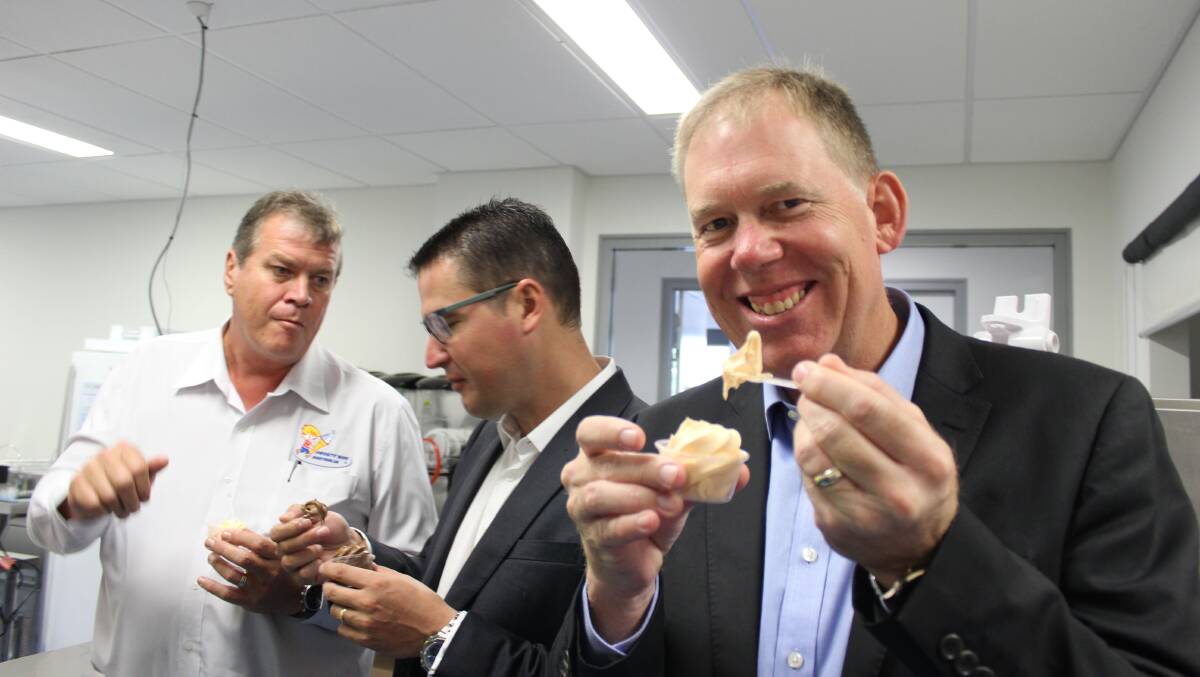 JUST DESSERTS: Forde MP Bert van Manen with Minister Zed Seselja and Frosty Boy CEO Doug Dirk.
