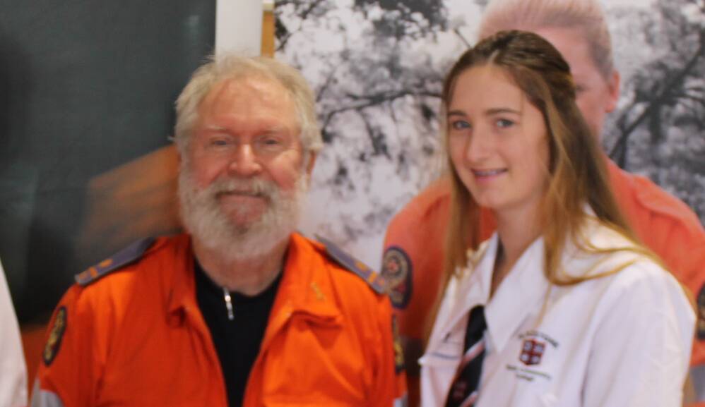 Terry Chapman snapped with a student at at careers expo at Flagstone Careers Expo in 2016. Photo: Supplied