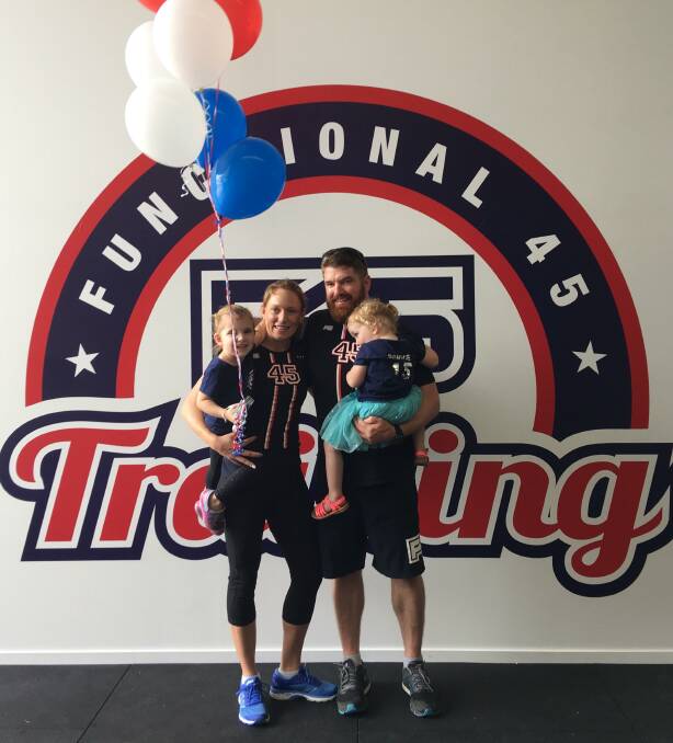 FUN: F45 Jimboomba's Krystal and Michael with Briar and Bonnie. Photo: Supplied 
