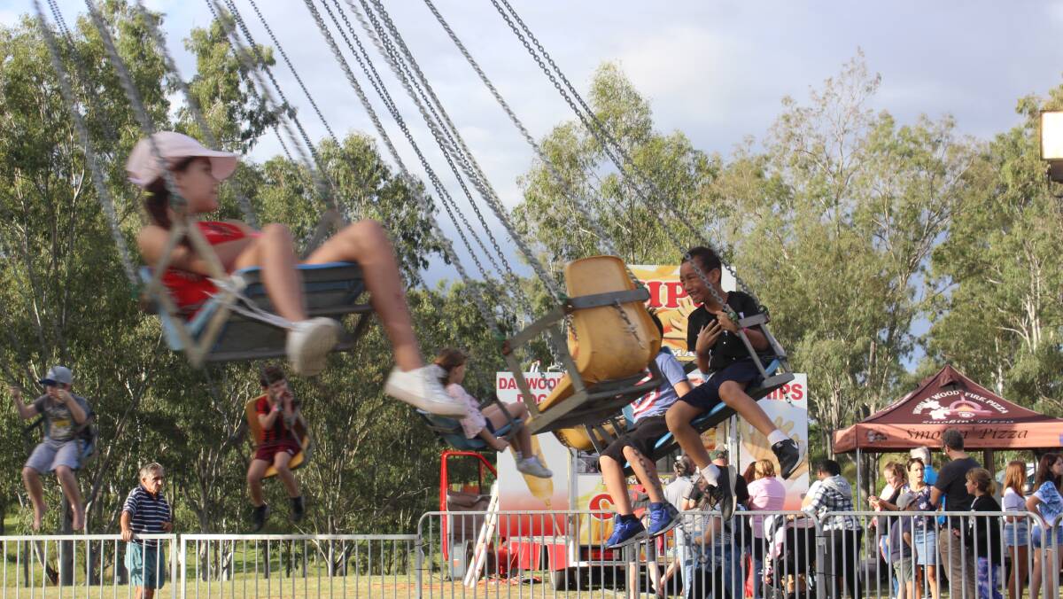 Thousands turned out to help Jimboomba State School celebrate its first school fete in 20 years.