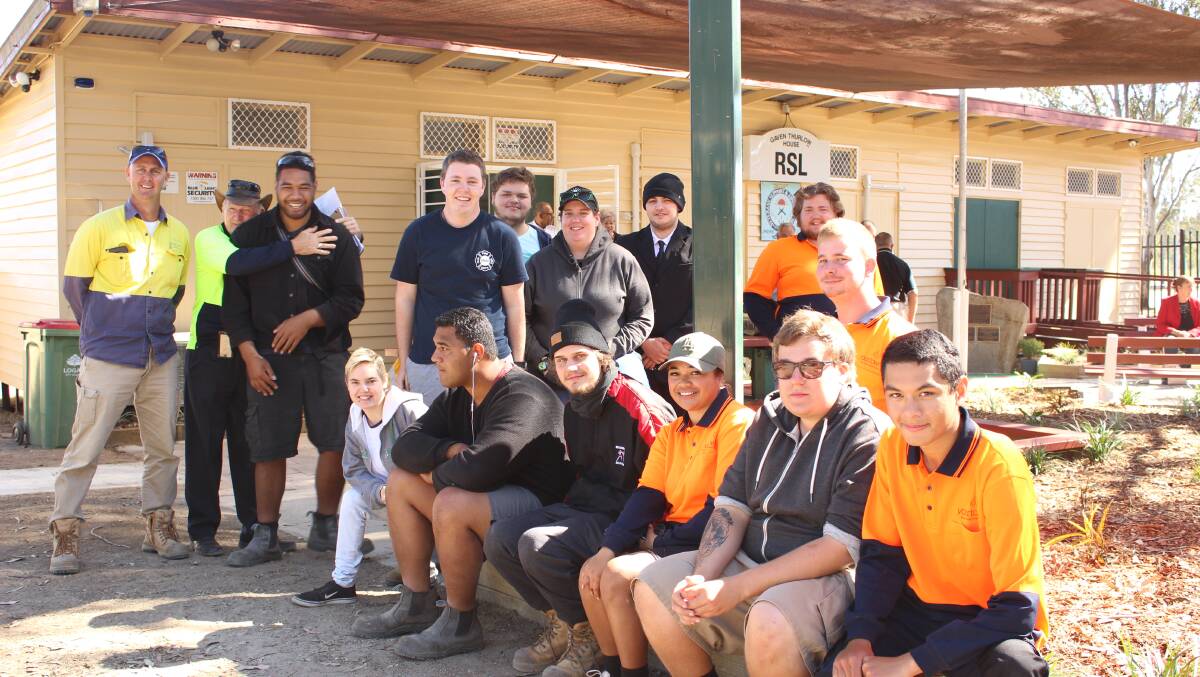 TRADIE TRAINING: Jimboomba and Yarrabilba trainees with (far left) Yarra project manager Darren Brushe and Jimboomba project manager Barry Power. 