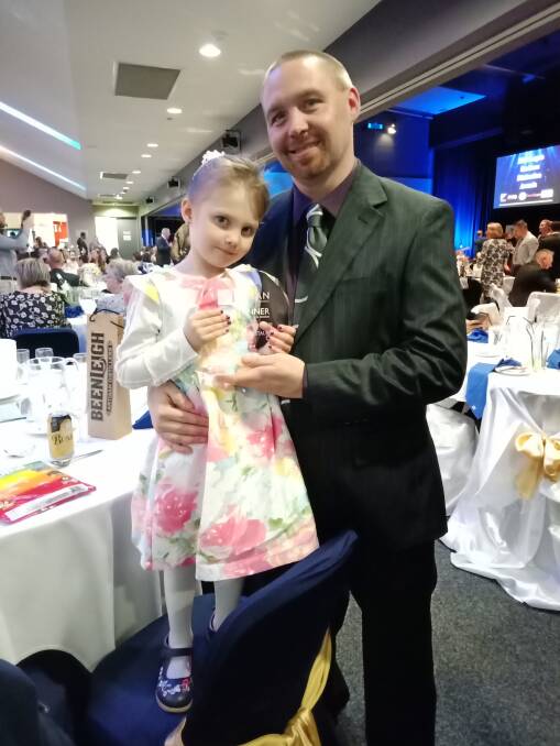 GONG: Scott Roebig and daughter Annabelle at the Logan Business Distinction Awards. Photo: Lisa Simmons