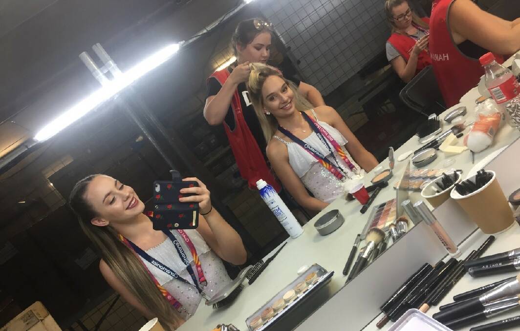 CANCELLATION: Amy Browne and Jennifer Schneider in hair and makeup behind the scenes of the Commonwealth Games closing ceremony.