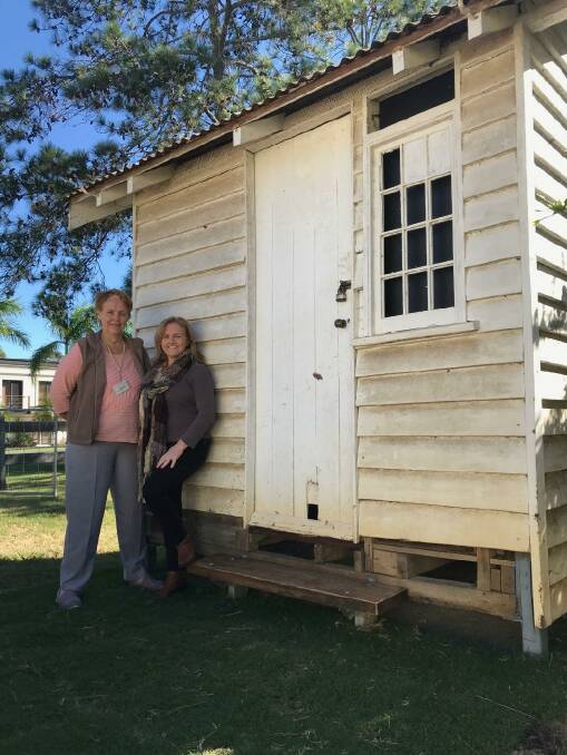 NEW LIFE: Museum volunteer Jan Evans and Cr Laurie Koranski by the hut. Photo: Supplied