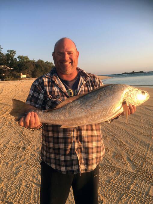 CATCH: Michael Gibson with a mulloway caught on the eastern beach, Moreton Island.