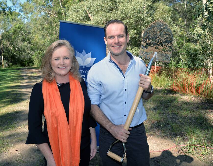 WORK TO START: Logan City Council's Jon Raven and Laurie Koranski at the sod turning for the Logan Village to Yarrabilba Rail Trail. 