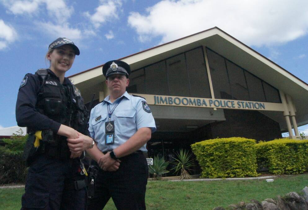 Constable Hayley Fitzpatrick with Acting Senior Sergeant Adrian Burns at Jimboomba Police Station.