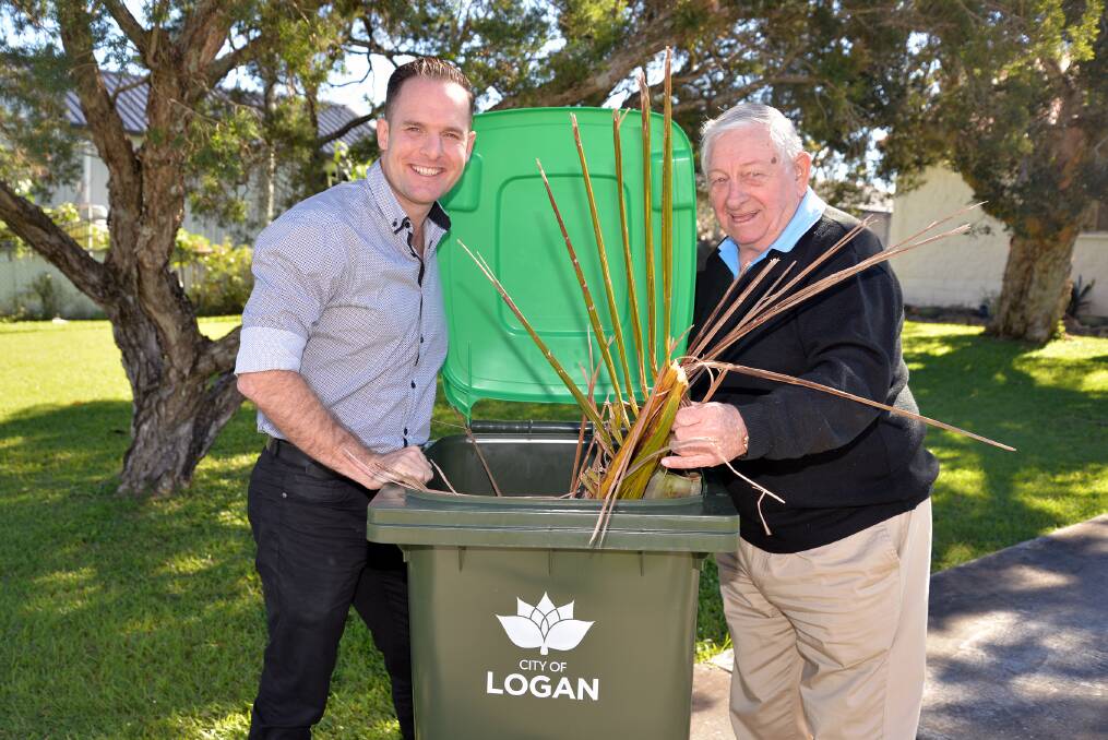 FIRST USE: Deputy mayor Jon Raven and Waterford West man Norman Chant with Mr Chant's new green bin. 