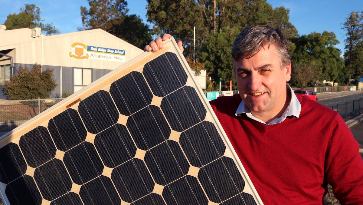 Economy boost: Logan MP Linus Power has welcomed solar power installations at Park Ridge schools.
