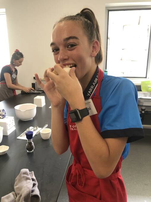 Delicious: Imogen Bennetts enjoying a treat on the day when Jamie Oliver's Ministry of Food visited Yarrabilba State Secondary College.