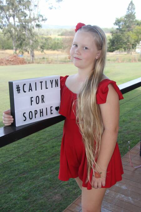 Before: Caitlyn Arnold ahead of her fundraising cut yesterday.